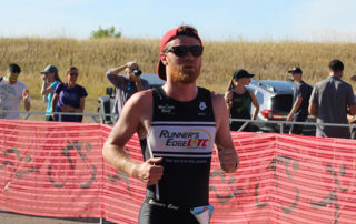 Matthew running during a triathlon